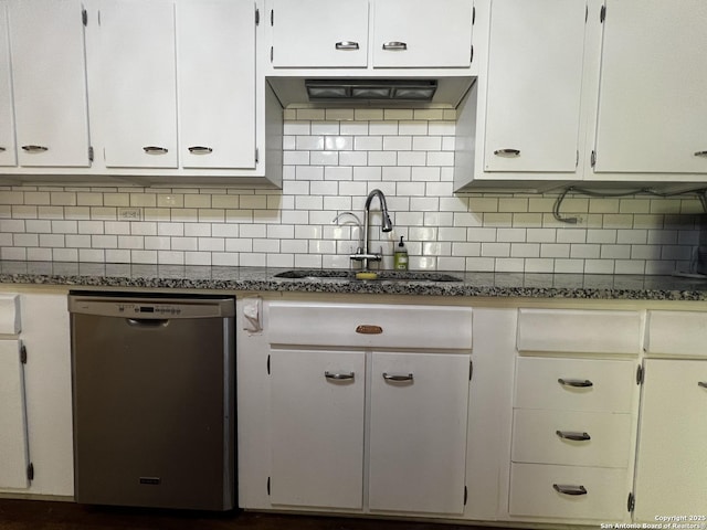 1024 W Mistletoe, San Antonio, TX 78201 - kitchen with stainless steel dishwasher, a sink, decorative backsplash, and white cabinets