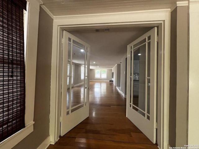 1024 W Mistletoe, San Antonio, TX 78201 - corridor with crown molding, dark wood finished floors, and baseboards