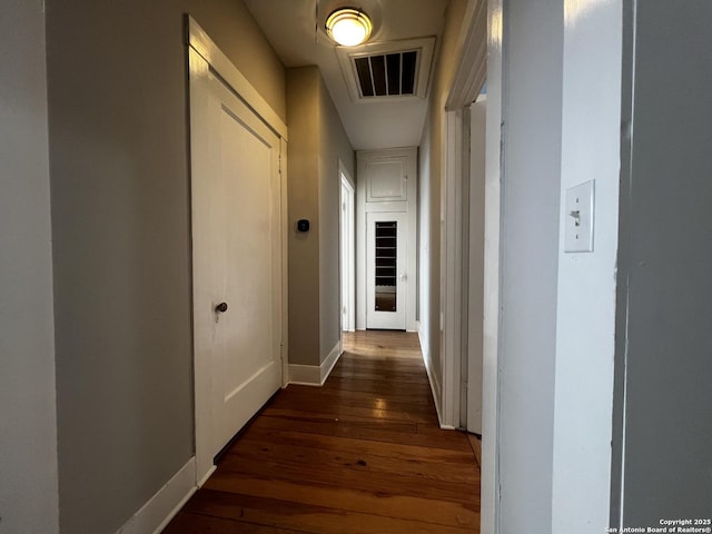 1024 W Mistletoe, San Antonio, TX 78201 - corridor with dark wood-style floors and baseboards