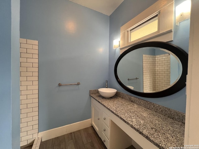1024 W Mistletoe, San Antonio, TX 78201 - full bathroom featuring vanity, wood finished floors, and baseboards