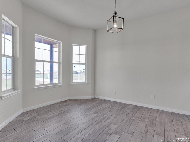 14329 Wisdom, Atascosa, TX 78002 - empty room with light wood finished floors and baseboards