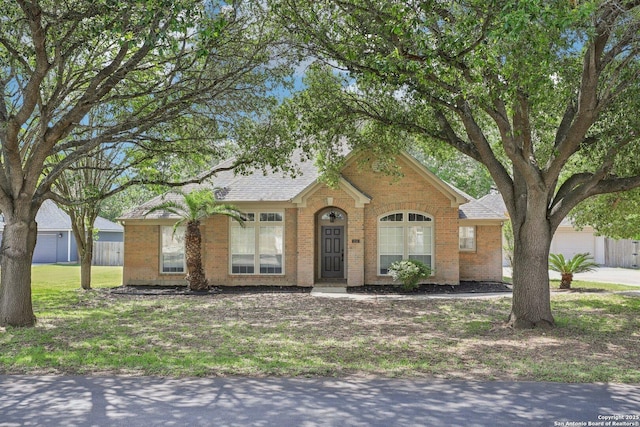 251 Las Brisas, Seguin, TX 78155 - view of front of house featuring brick siding and roof with shingles