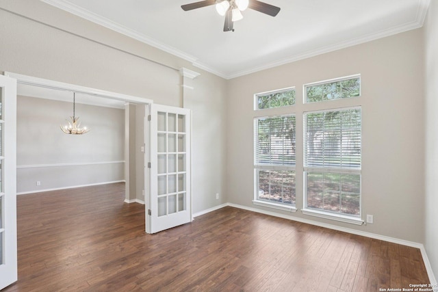 251 Las Brisas, Seguin, TX 78155 - spare room with a ceiling fan, wood finished floors, a chandelier, ornamental molding, and baseboards