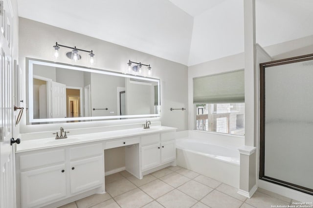 251 Las Brisas, Seguin, TX 78155 - bathroom featuring a bath, double vanity, tile patterned flooring, a shower stall, and lofted ceiling