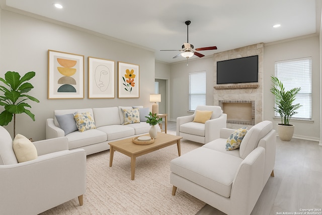 15608 York Ln, Selma, TX 78154 - living room featuring ceiling fan, plenty of natural light, baseboards, a fireplace, and recessed lighting