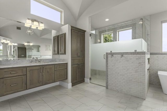 8602 Terra Mont Way, San Antonio, TX 78255 - full bath with marble finish flooring, a stall shower, vanity, a soaking tub, and vaulted ceiling