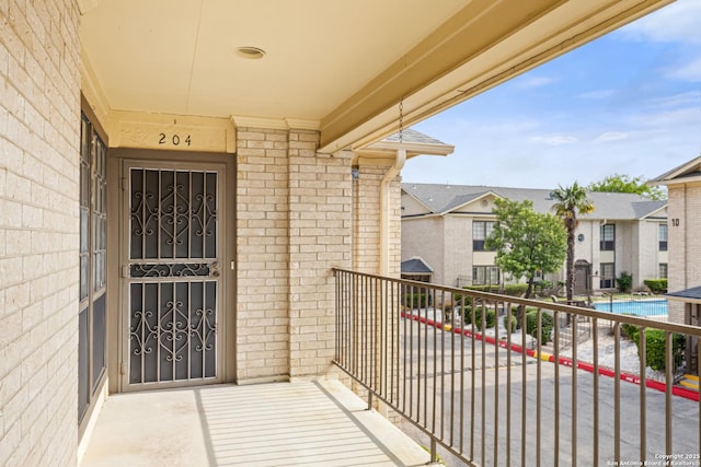 165 W Rampart Unit 204, San Antonio, TX 78216 - balcony with view of pool area