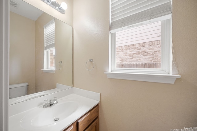 9026 Foxgrove Way, San Antonio, TX 78251 - half bath featuring vanity and toilet