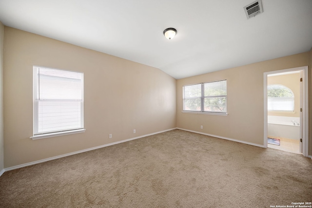 9026 Foxgrove Way, San Antonio, TX 78251 - spare room featuring carpet, baseboards, and lofted ceiling