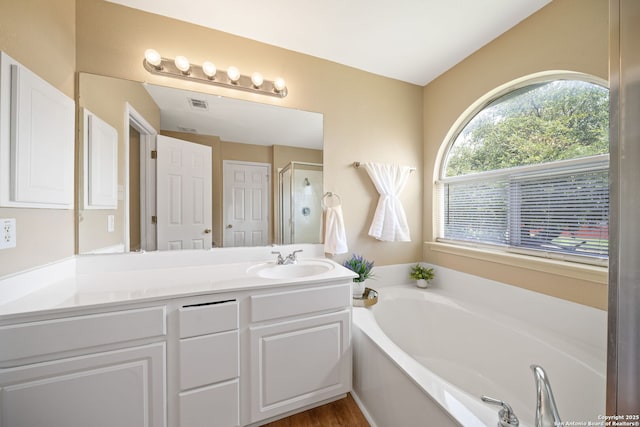 9026 Foxgrove Way, San Antonio, TX 78251 - full bath with a garden tub, vanity, and a stall shower