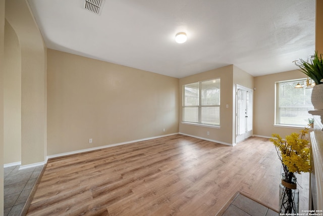 9026 Foxgrove Way, San Antonio, TX 78251 - unfurnished living room with light wood-type flooring and baseboards