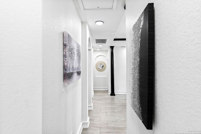 3307 W Salinas, San Antonio, TX 78207 - hallway featuring a textured wall and baseboards