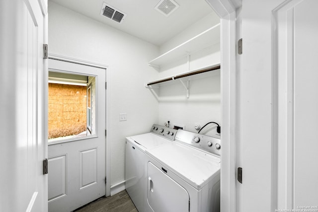 3307 W Salinas, San Antonio, TX 78207 - laundry area with independent washer and dryer, dark wood-style flooring, and arched walkways