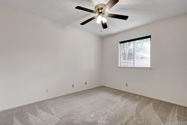 5810 Sky Country, San Antonio, TX 78247 - empty room with a textured ceiling, carpet floors, ceiling fan, and baseboards
