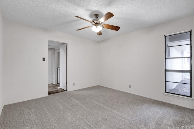 5810 Sky Country, San Antonio, TX 78247 - carpeted empty room featuring a ceiling fan, a textured ceiling, and baseboards