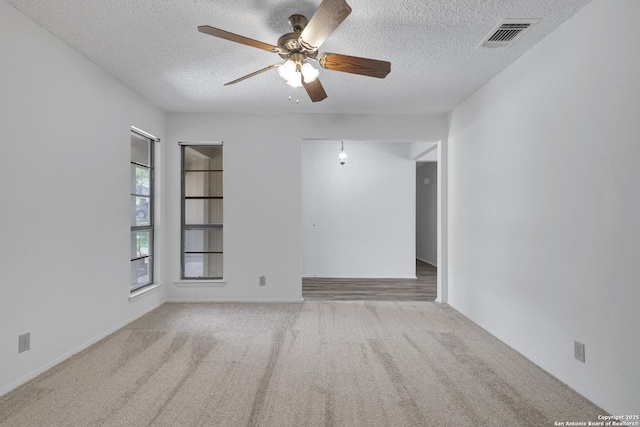 5810 Sky Country, San Antonio, TX 78247 - carpeted empty room featuring a textured ceiling and a ceiling fan