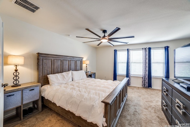3006 Mission Bell, San Antonio, TX 78224 - bedroom with light carpet, ceiling fan, and baseboards