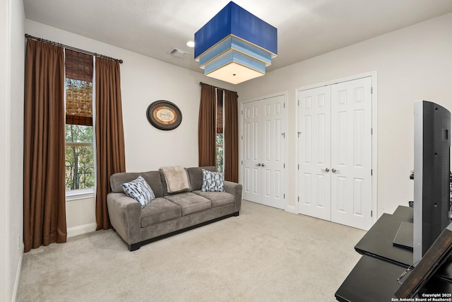 24706 Moorland, San Antonio, TX 78257 - living area with carpet flooring and baseboards