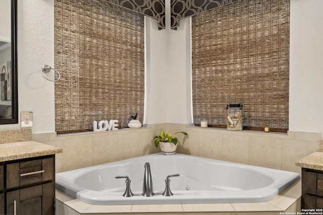 24706 Moorland, San Antonio, TX 78257 - bathroom with vanity and a whirlpool tub