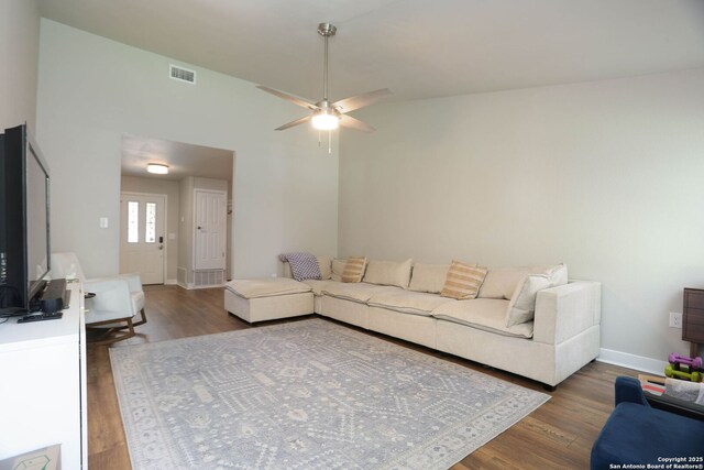 6203 Callen Gln, San Antonio, TX 78233 - living area with wood finished floors, a ceiling fan, and baseboards