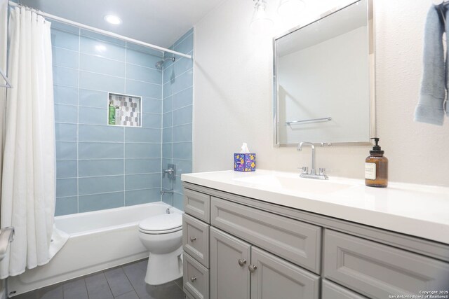 6203 Callen Gln, San Antonio, TX 78233 - bathroom with tile patterned floors, vanity, toilet, and shower / tub combo