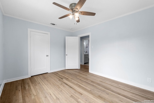 131 New Hvn, San Antonio, TX 78209 - unfurnished bedroom with light wood finished floors, baseboards, ornamental molding, and ceiling fan