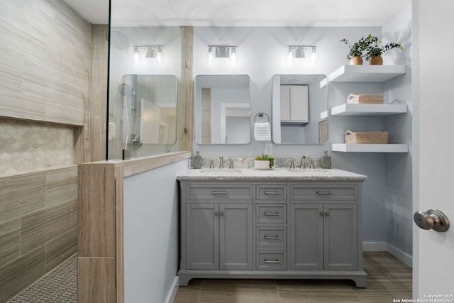 131 New Hvn, San Antonio, TX 78209 - bathroom with a walk in shower, double vanity, and baseboards