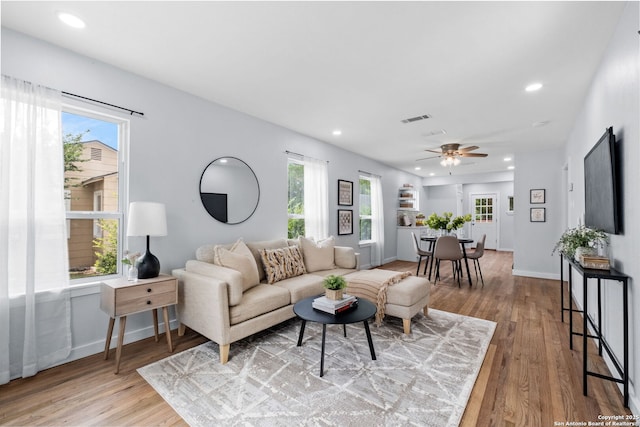 131 New Hvn, San Antonio, TX 78209 - living room featuring wood finished floors, a ceiling fan, recessed lighting, and baseboards