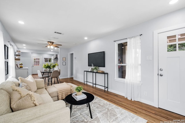 131 New Hvn, San Antonio, TX 78209 - living room with wood finished floors, recessed lighting, a ceiling fan, and baseboards