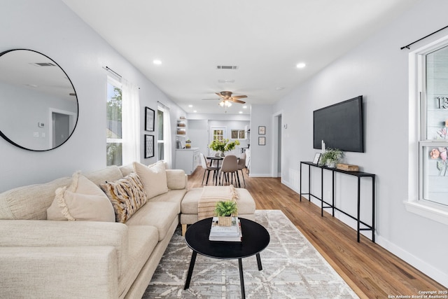 131 New Hvn, San Antonio, TX 78209 - living area featuring wood finished floors, ceiling fan, recessed lighting, and baseboards
