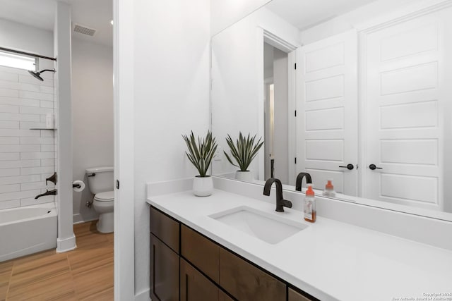 1512 Aubrey Pt, San Antonio, TX 78260 - full bath featuring vanity, toilet, bathing tub / shower combination, and wood finished floors