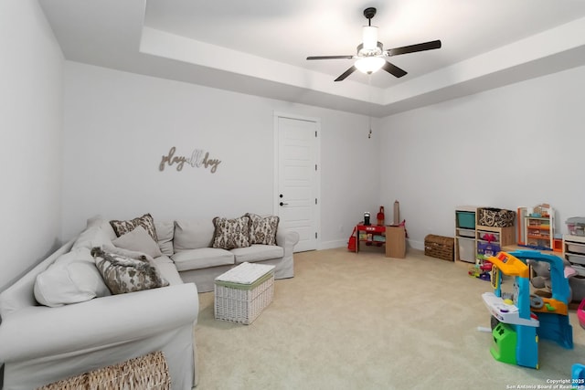 1512 Aubrey Pt, San Antonio, TX 78260 - living area featuring ceiling fan, a raised ceiling, carpet, and baseboards