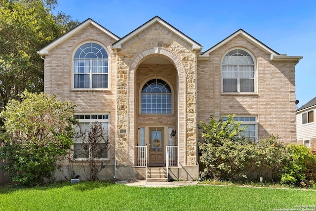 9106 Thomas York, San Antonio, TX 78251 - traditional-style home with brick siding and a front yard