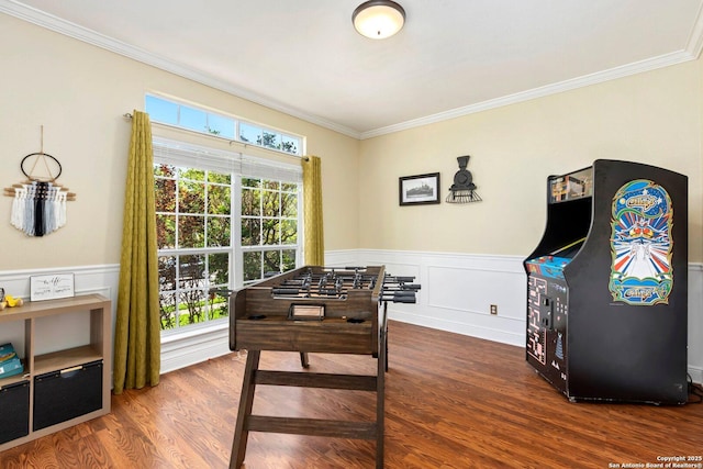9106 Thomas York, San Antonio, TX 78251 - rec room with ornamental molding, wood finished floors, wainscoting, and a decorative wall