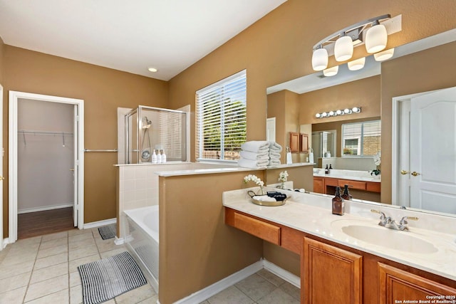 9106 Thomas York, San Antonio, TX 78251 - full bathroom featuring a shower stall, a garden tub, tile patterned flooring, and vanity