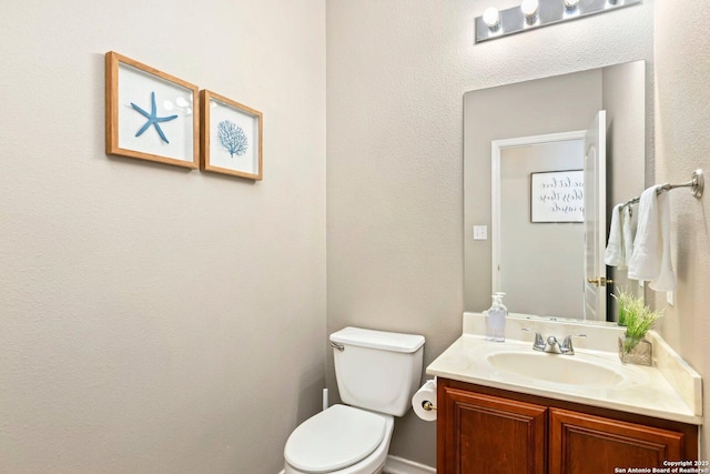 9106 Thomas York, San Antonio, TX 78251 - half bathroom featuring vanity and toilet