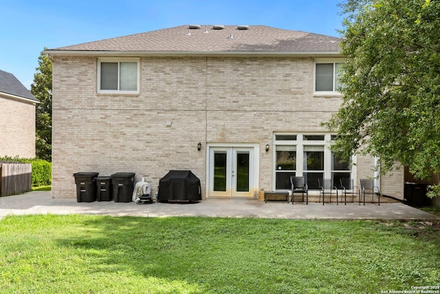 9106 Thomas York, San Antonio, TX 78251 - back of house with french doors, a patio area, a yard, and brick siding