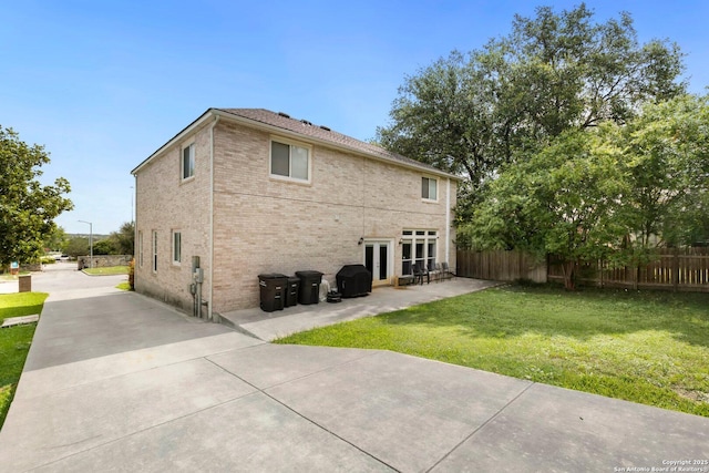 9106 Thomas York, San Antonio, TX 78251 - rear view of property featuring a patio, brick siding, and french doors