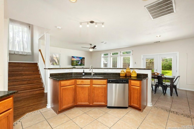 9106 Thomas York, San Antonio, TX 78251 - kitchen with dishwasher, light tile patterned floors, a ceiling fan, and french doors