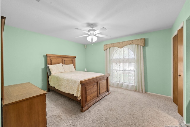 9219 George Kyle St, San Antonio, TX 78240 - bedroom featuring light colored carpet and ceiling fan