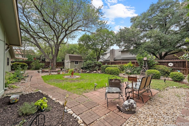 9219 George Kyle St, San Antonio, TX 78240 - view of patio / terrace featuring a fire pit