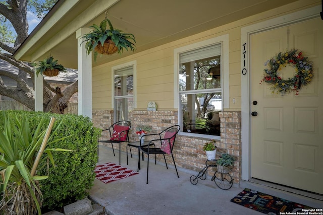 7710 Allison Blf, San Antonio, TX 78240 - entrance to property featuring a porch and brick siding