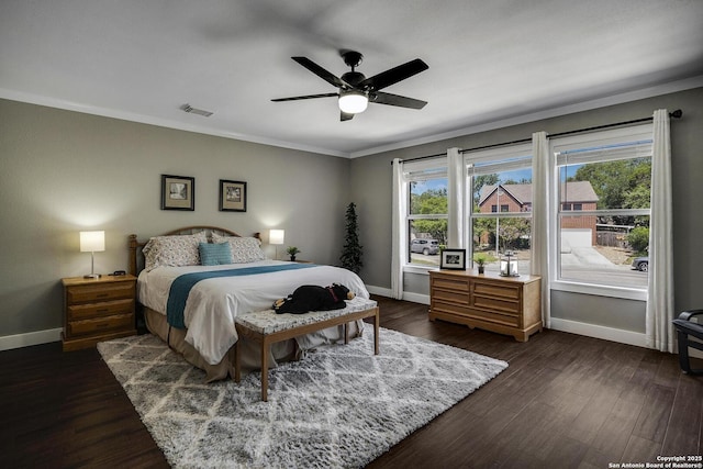 7710 Allison Blf, San Antonio, TX 78240 - bedroom featuring baseboards, crown molding, dark wood-style flooring, and a ceiling fan