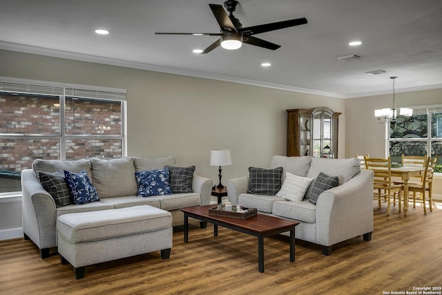 7710 Allison Blf, San Antonio, TX 78240 - living room featuring ornamental molding, a chandelier, wood finished floors, a ceiling fan, and recessed lighting