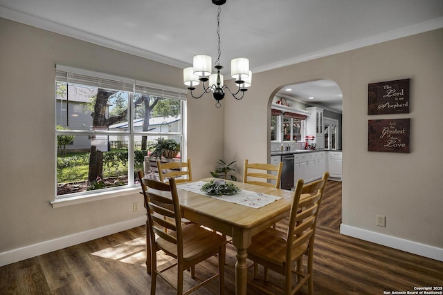 7710 Allison Blf, San Antonio, TX 78240 - dining space with arched walkways, baseboards, a chandelier, dark wood finished floors, and crown molding