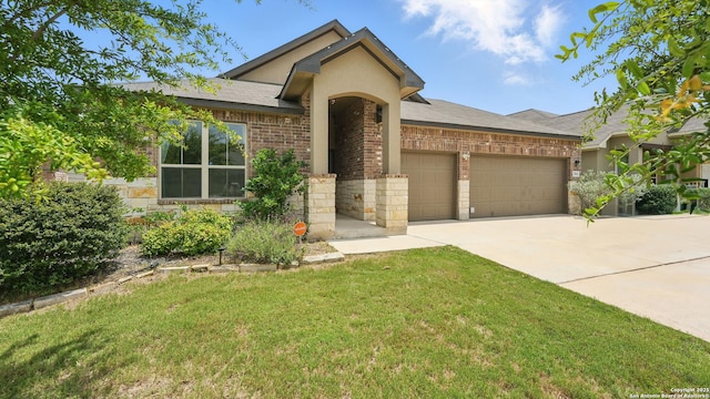 3542 Hurricane, New Braunfels, TX 78130 - view of front of home with an attached garage, brick siding, concrete driveway, a front lawn, and a shingled roof