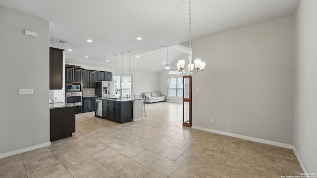 3542 Hurricane, New Braunfels, TX 78130 - kitchen with open floor plan, appliances with stainless steel finishes, a chandelier, baseboards, and recessed lighting