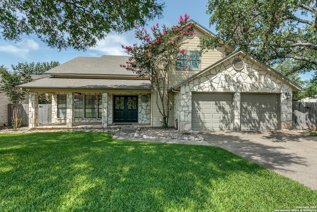 18039 Shady Knl, San Antonio, TX 78258 - view of front of property with a garage, concrete driveway, stone siding, and a porch