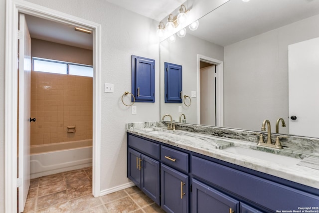 18039 Shady Knl, San Antonio, TX 78258 - full bathroom with double vanity, baseboards, and  shower combination