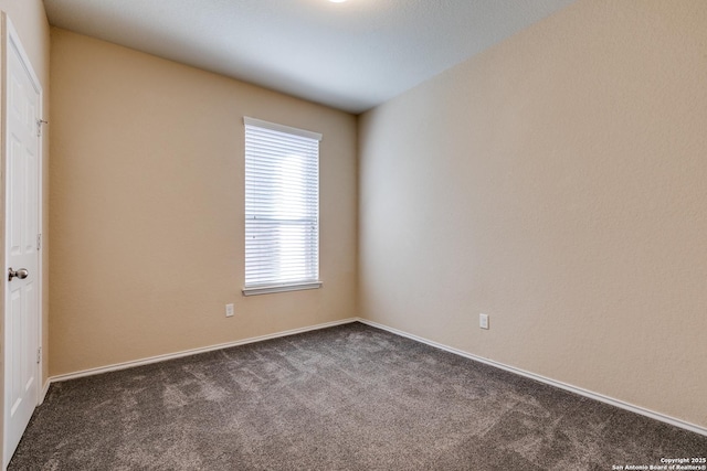 1614 Desert Candle, San Antonio, TX 78245 - spare room with dark carpet and baseboards